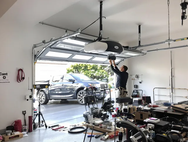 Bluffton Garage Door Repair specialist installing smart garage door opener system in Bluffton home